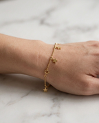 Astraea Golden Star Dangle Bracelet