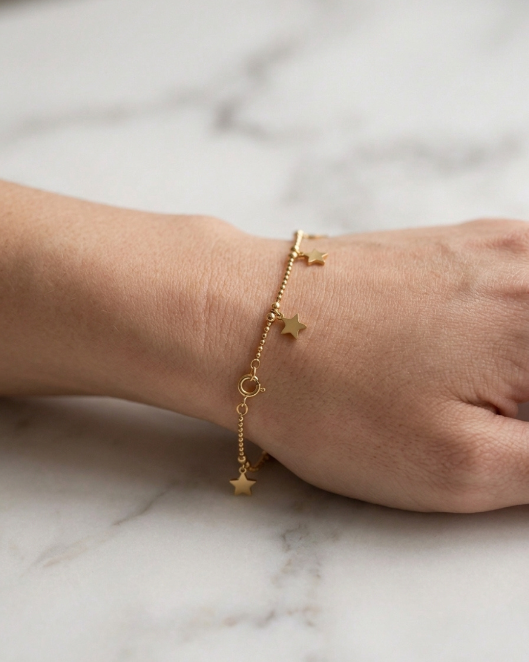 Astraea Golden Star Dangle Bracelet