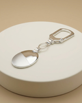 Dual Finish Oval Medallion Luxury Keychain